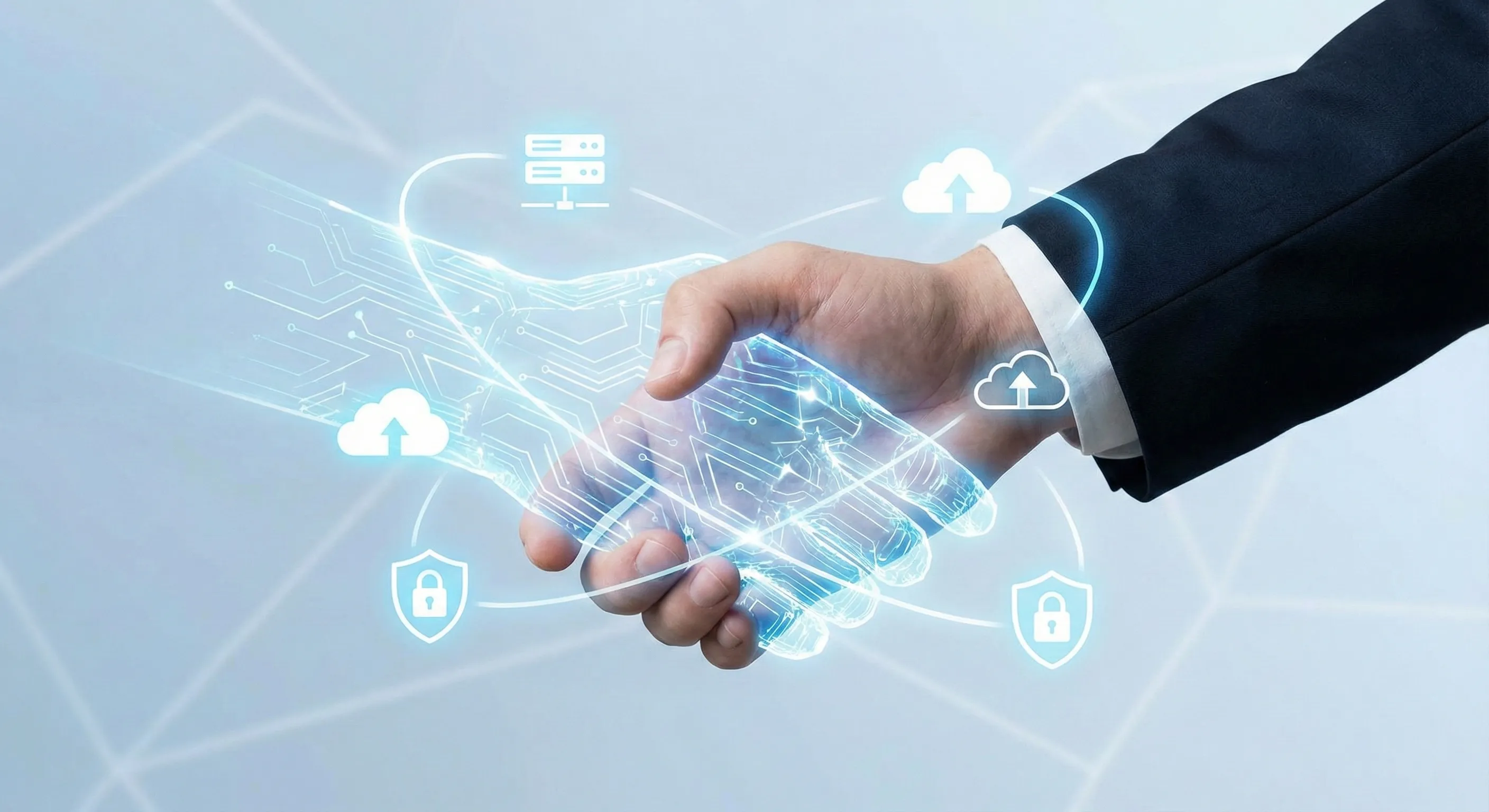 Two hands in a professional handshake, representing the partnership between businesses and managed IT service providers